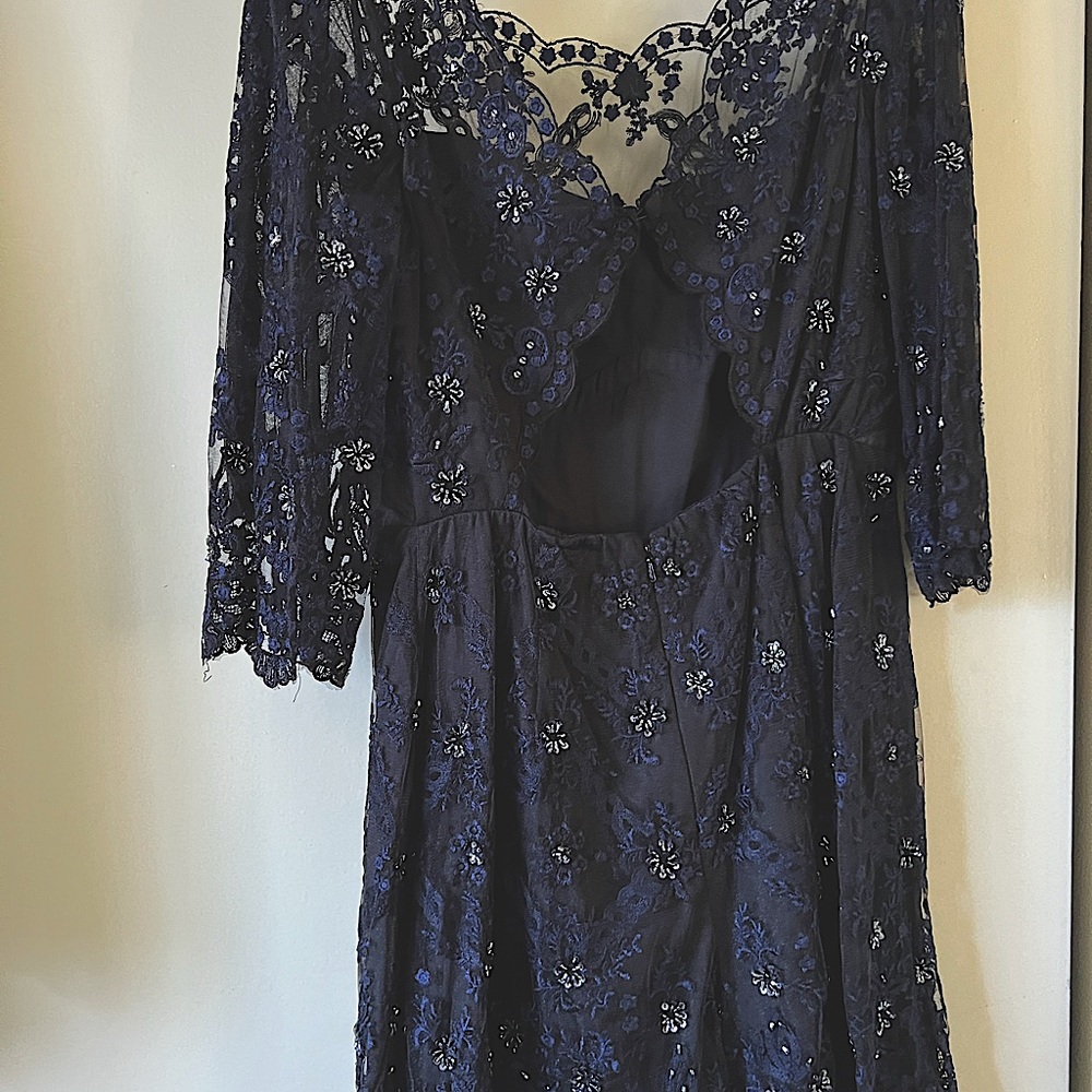 FREE PEOPLE RARE!!!!jeweled romper size 8 black and navy